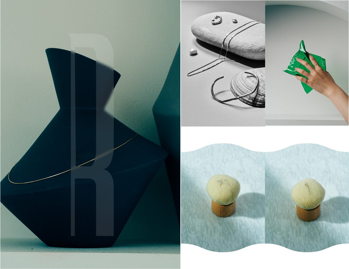 Jewelry still lifes on a sculptural vase, stones, shells and a soft brush