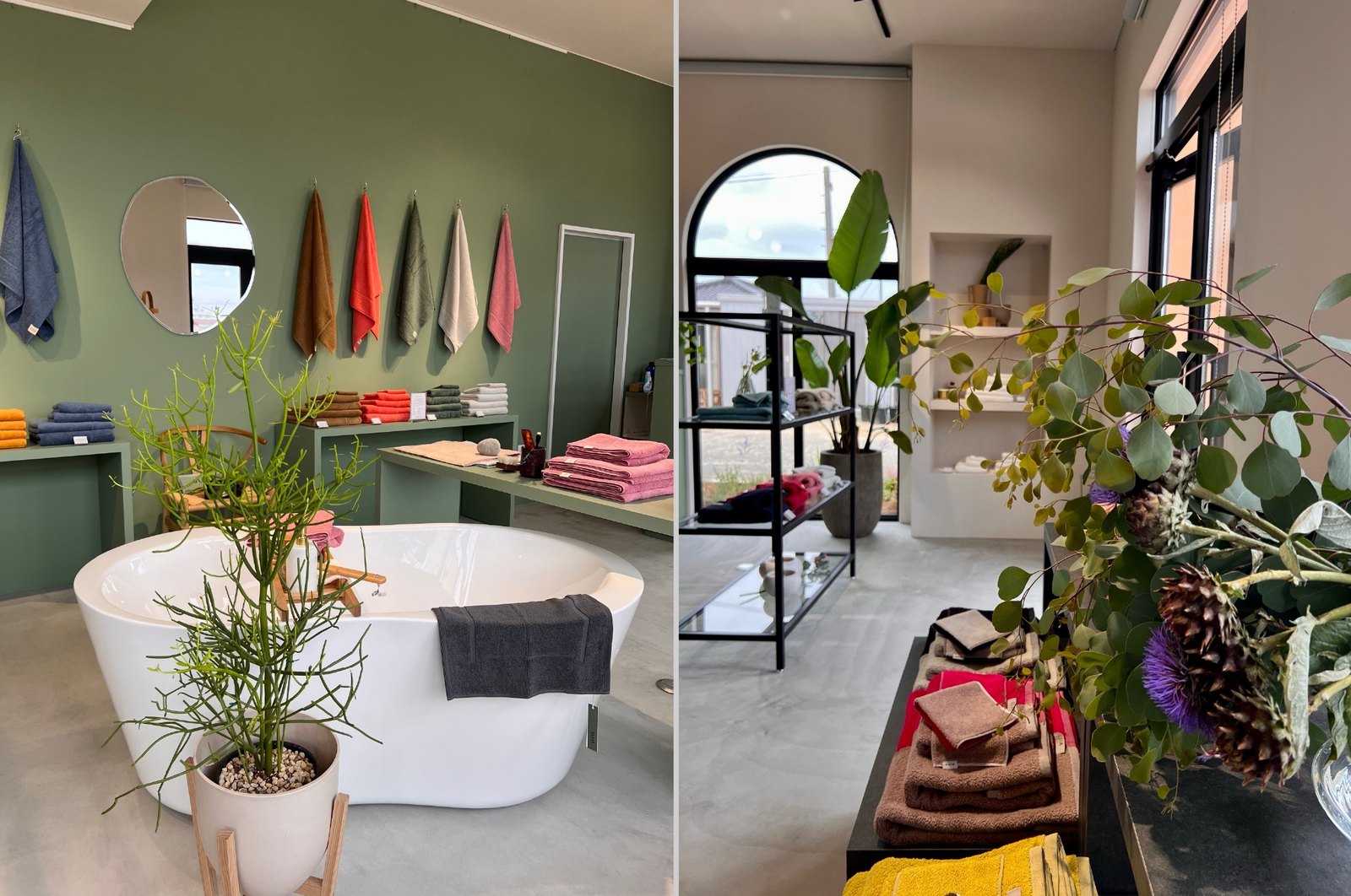 Concept shop interior with a freestanding bath and towel displays